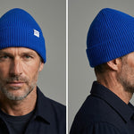 Lambswool Beanie in Royal Blue worn by a model – front and side view