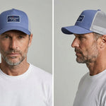 Trucker Cap in Dust Blue and Grey worn by a model – front and side view